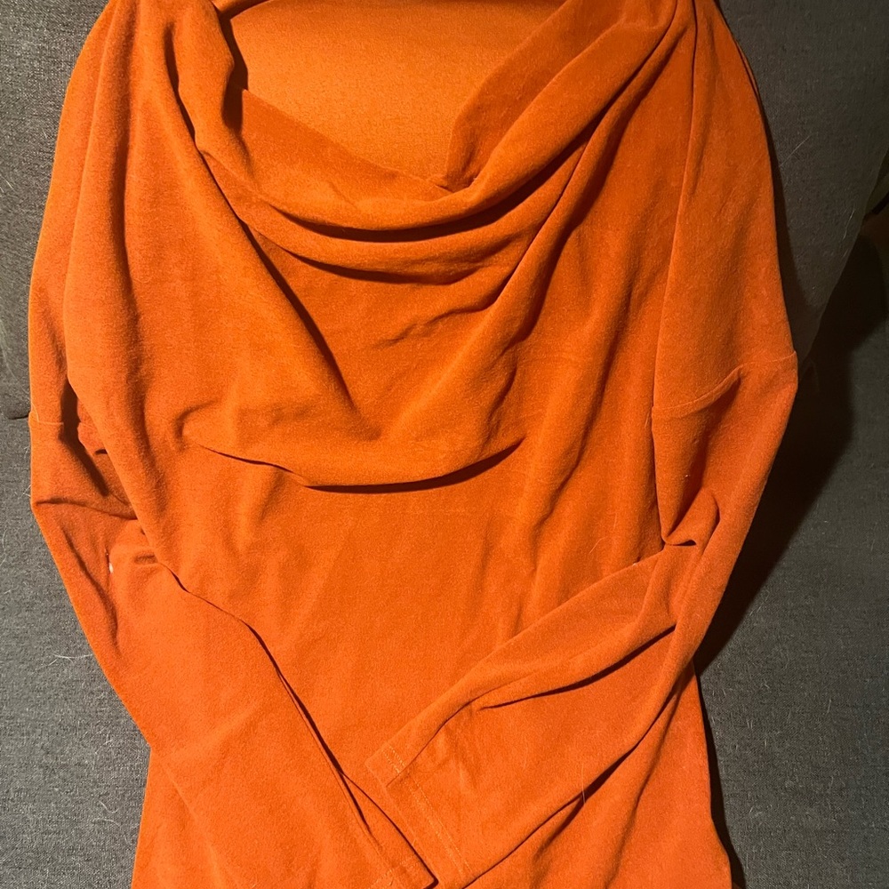 Women’s long sleeved cowl neck shirt.
